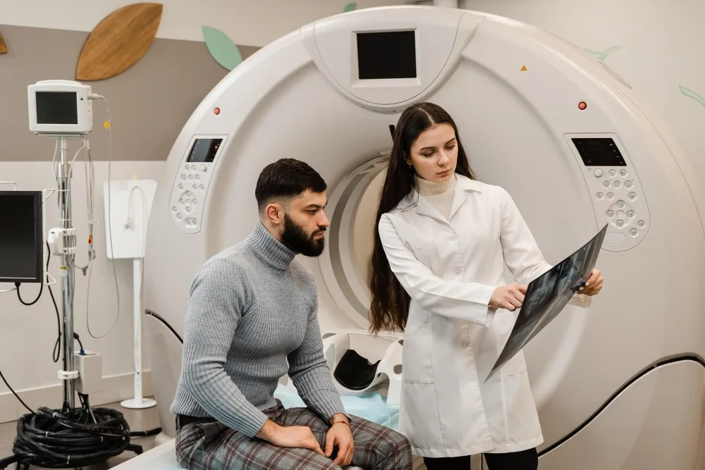 Doctor explaining CT scan.